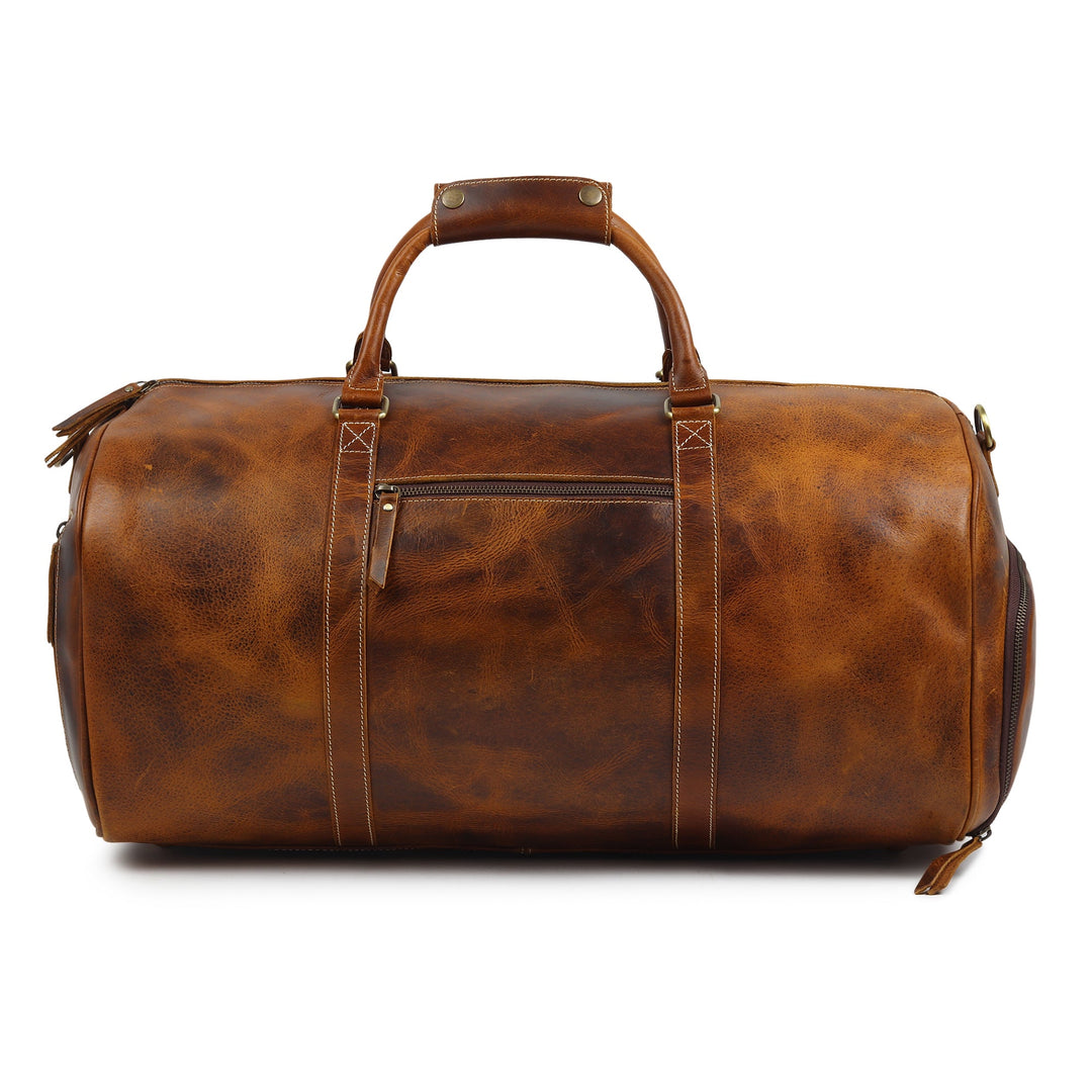 Brown leather duffel bag with top handle, front zipper, and side tassel pull.
