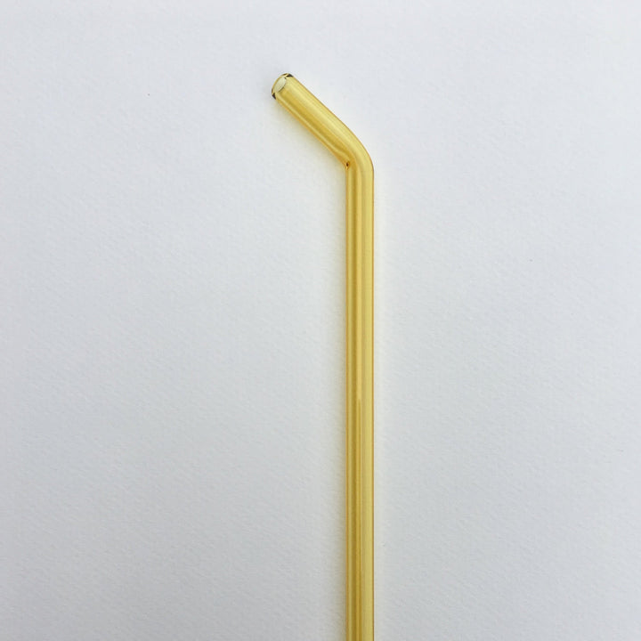 10-inch bent straw in honey amber, single straw on white background