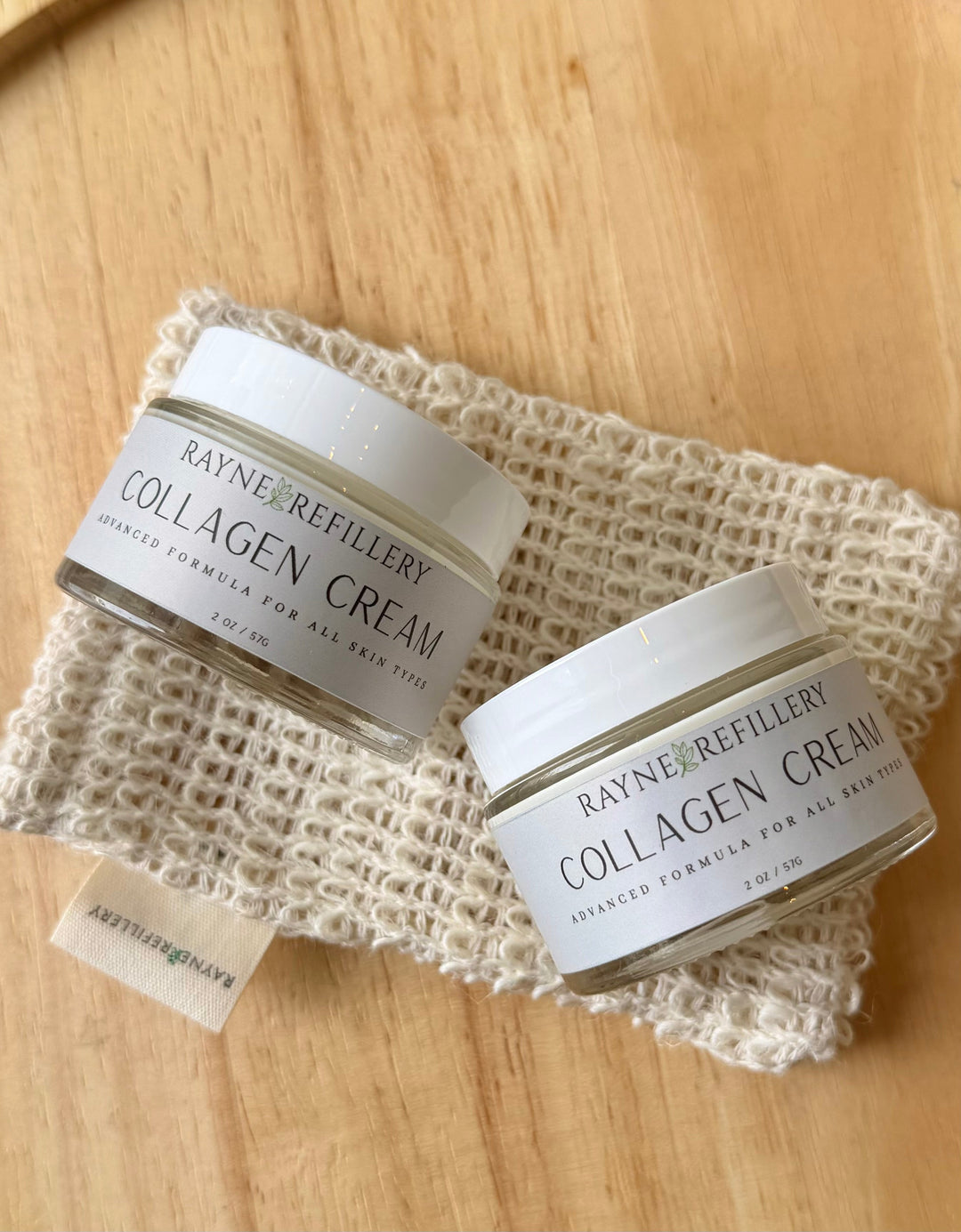 Collagen face cream tubs on knit mesh pouch, white plastic jar containers