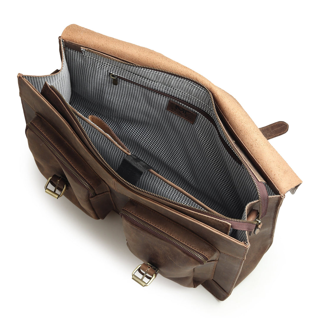 Leather messenger bag interior with patterned lining and zip pocket organizer