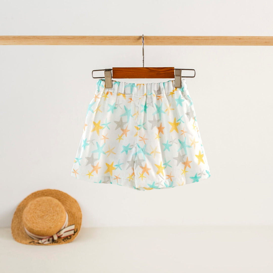 Organic muslin shorts with starfish print, elastic waistband, multicolor on light background
