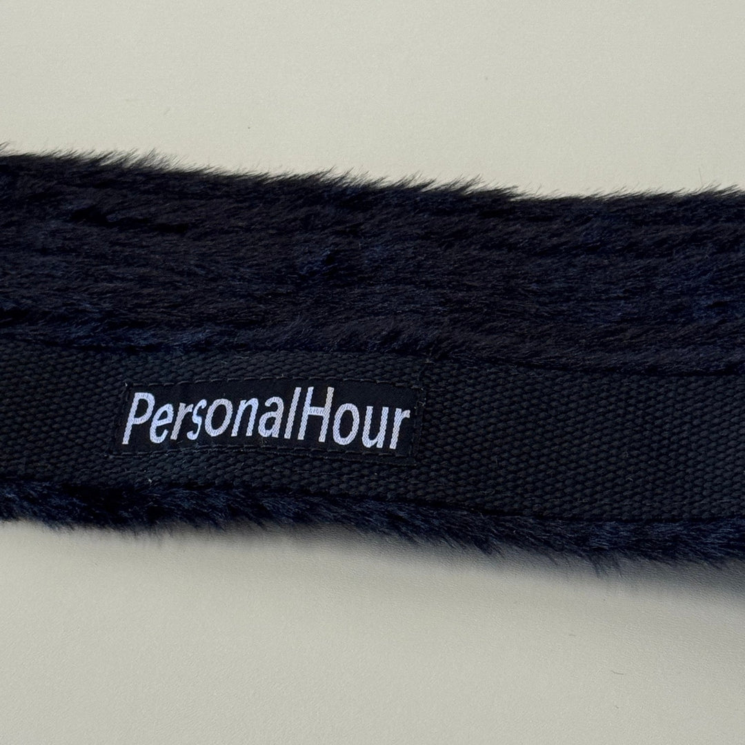 PersonalHour logo on dark navy fluffy foot strap webbing