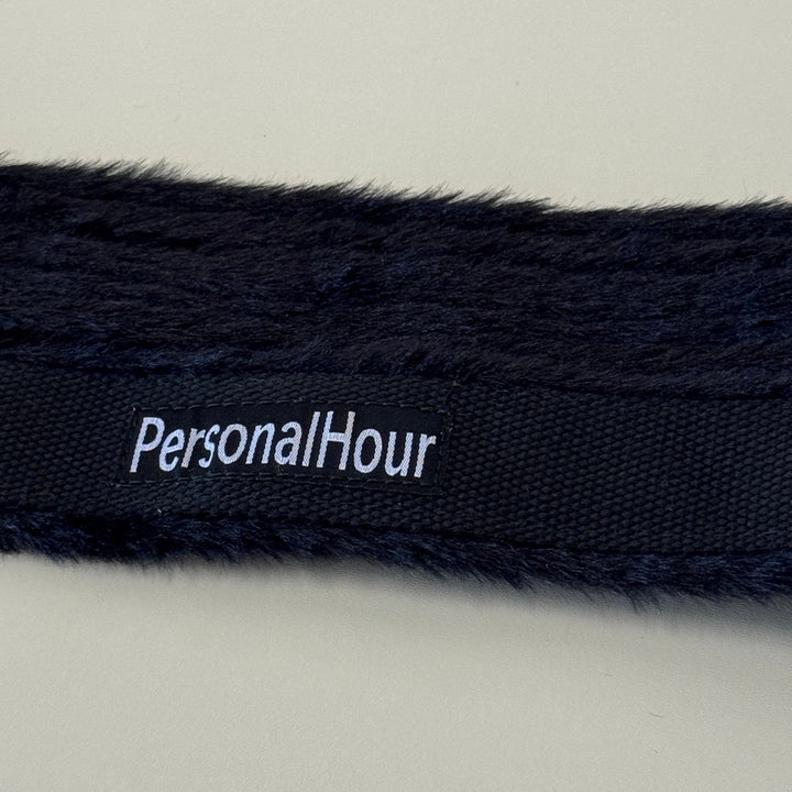 PersonalHour logo on dark navy fluffy foot strap webbing