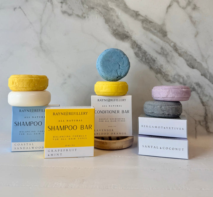 Solid shampoo bar assortment with pastel scent bars and matching cardboard boxes