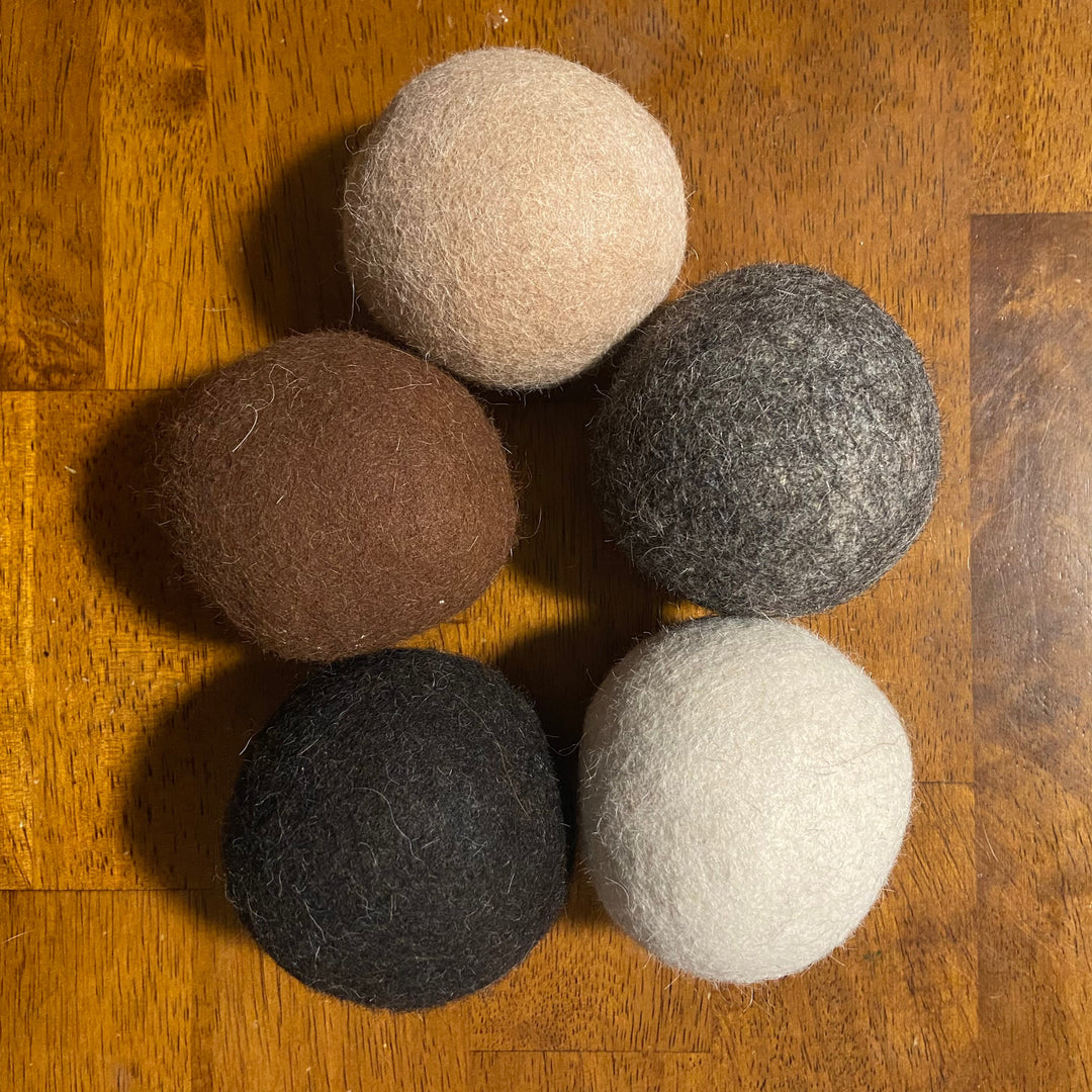 Wool dryer balls set of five felt spheres in brown, dark gray, and light colors