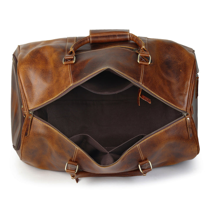 Brown buffalo leather duffel bag with dual top handles and open front zip pocket