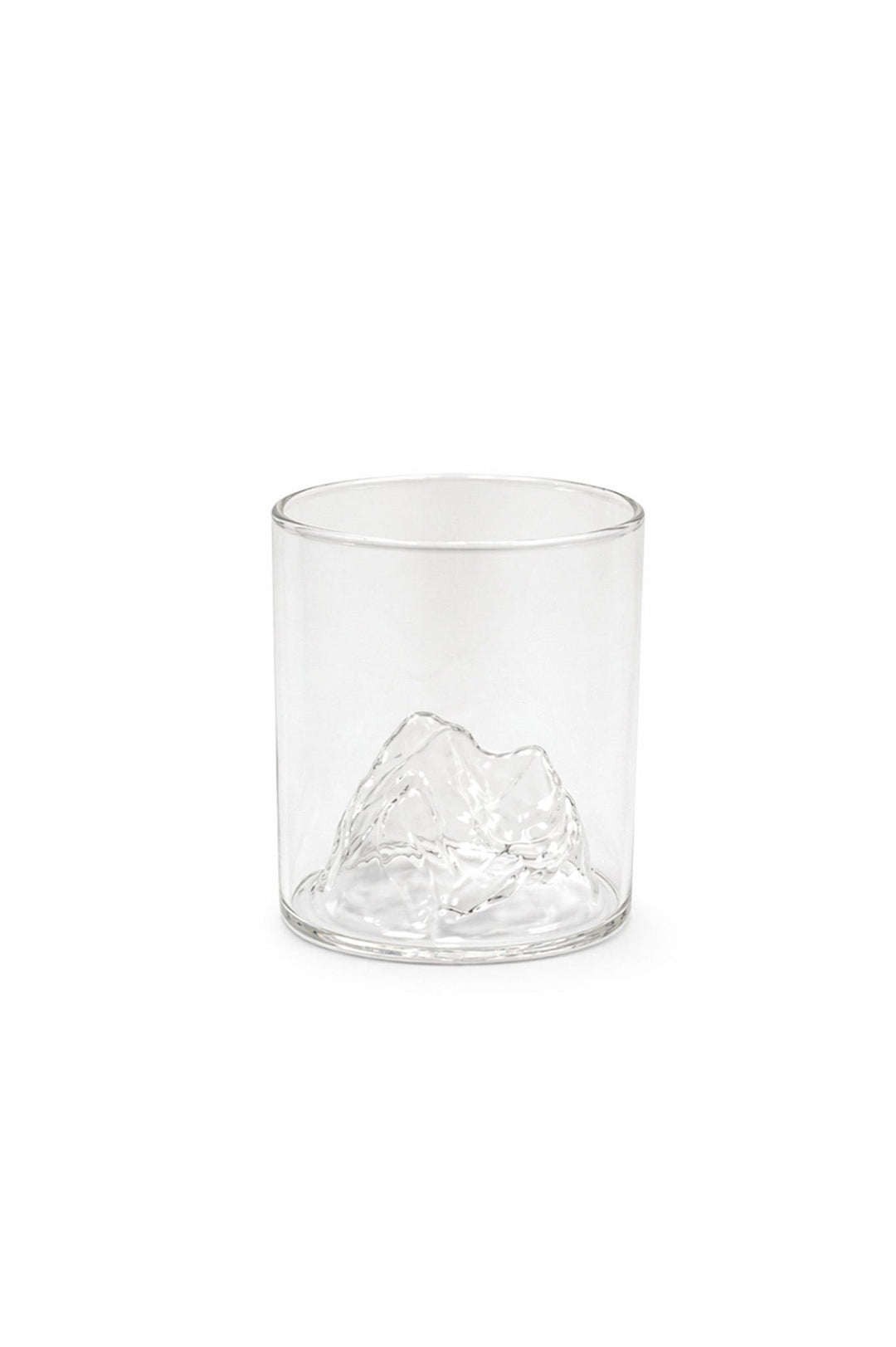 Clear whiskey tumbler with mountain range etched design and thick base
