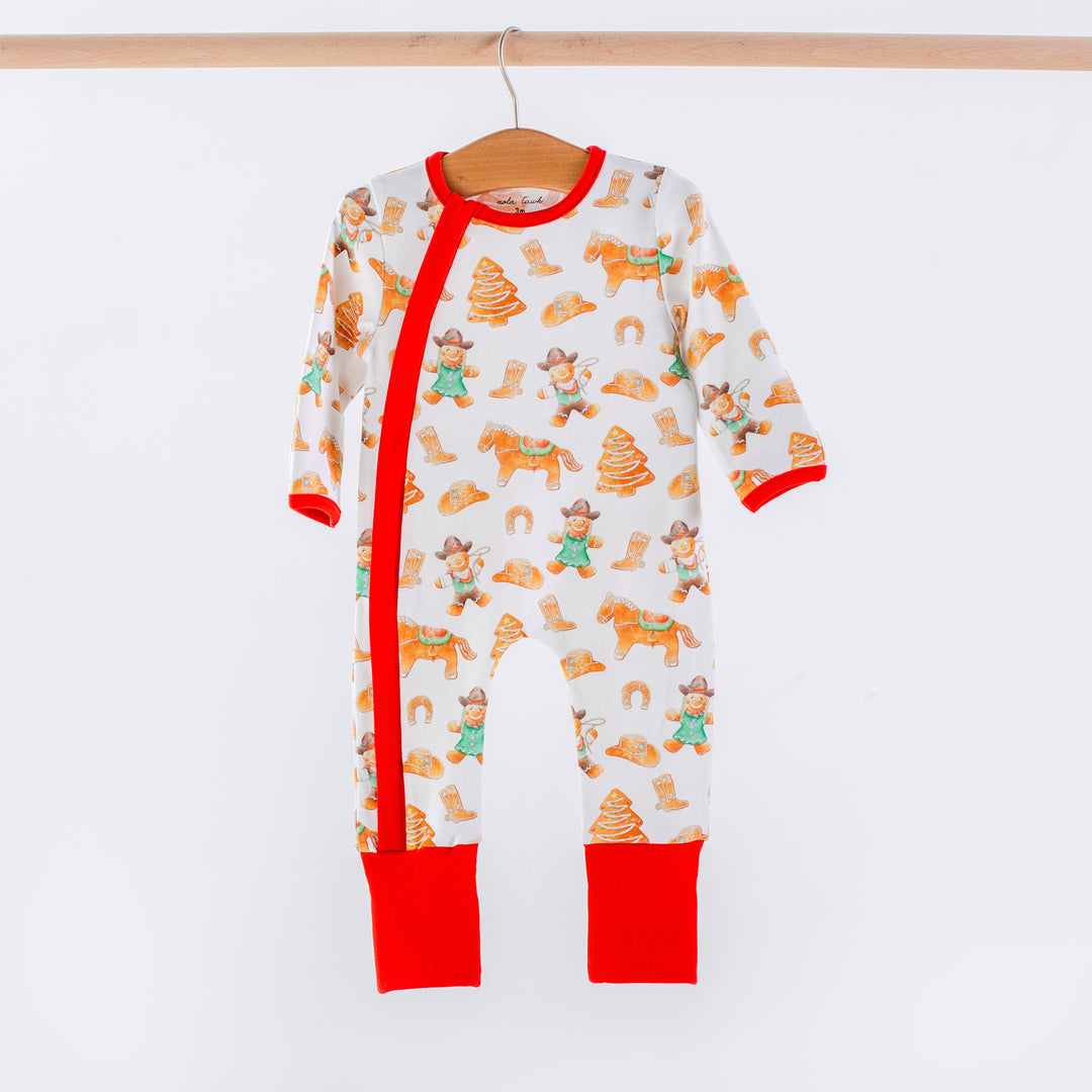 Organic cotton zip-up pajamas with long sleeves, allover cookie print, red trim and cuffs