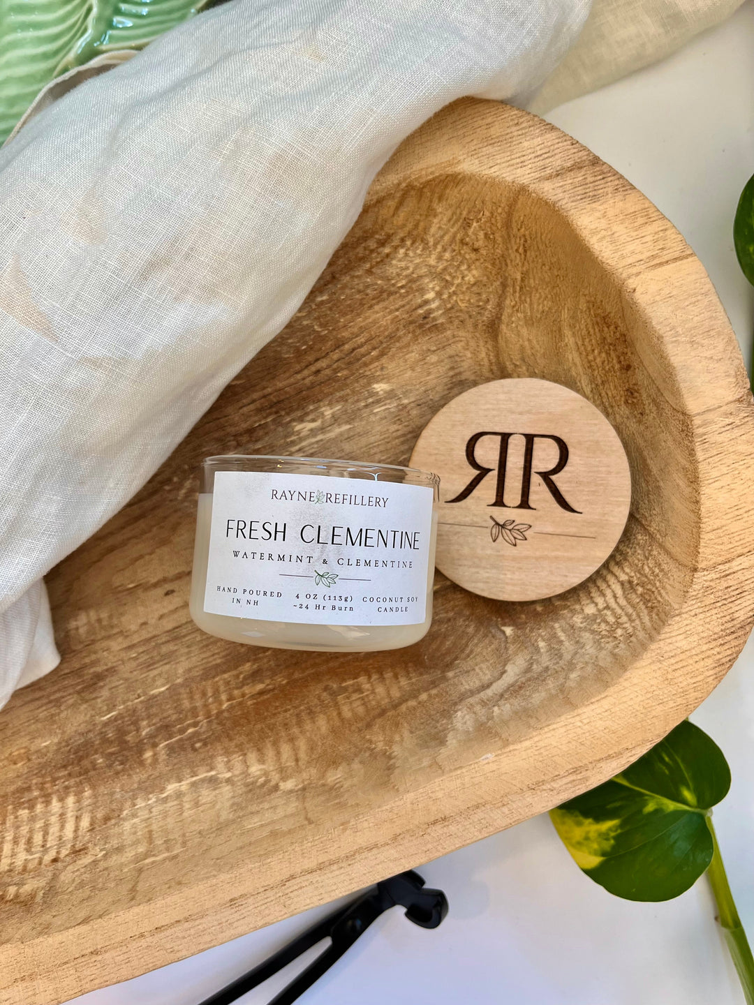 Coconut soy candle with Fresh Clementine label, wooden lid with monogram on tray
