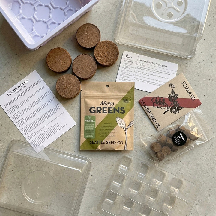Microgreens seed-starting kit contents: seed packet, instructions, peat pellets, trays