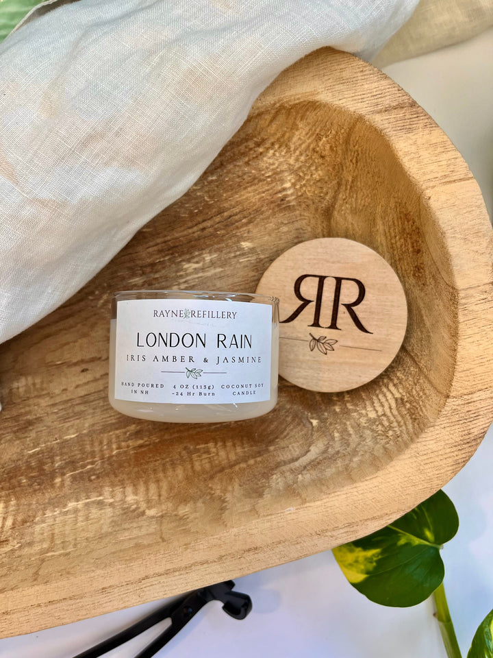 London Rain candle jar with label and wooden lid showing initials 'LR'