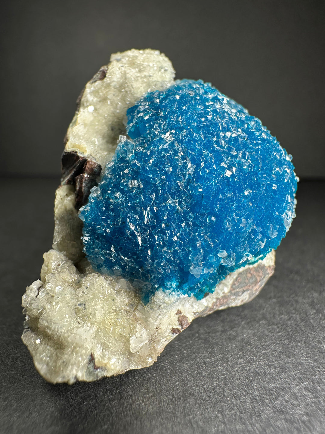 Blue cavansite on stilbite matrix specimen with pale crystals and dark rock