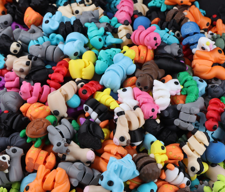 Animal fidget toy bundle with assorted small molded animal figures in mixed colors
