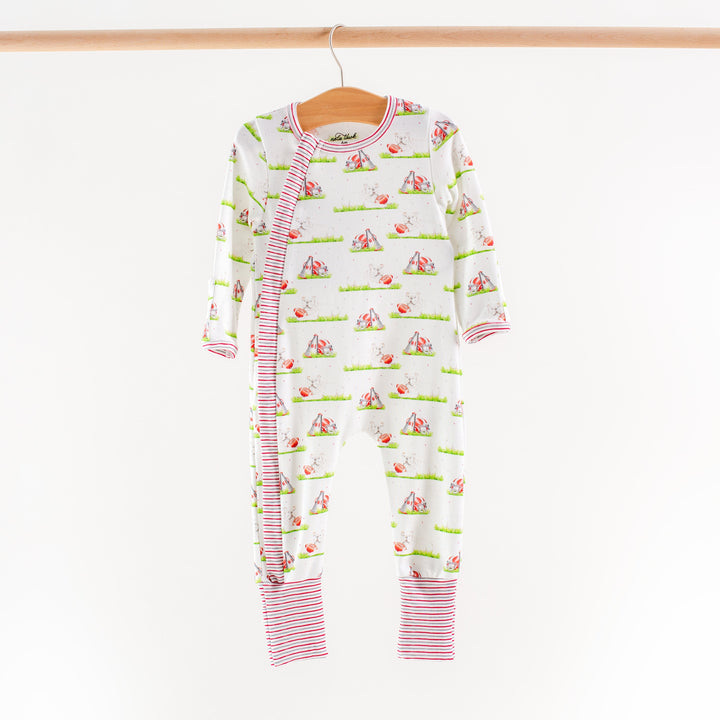 Boys dog-themed pajama set with allover print, white base, striped cuffs and neckline