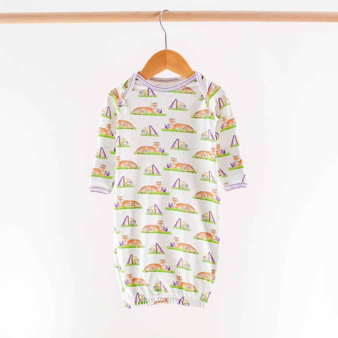 Kids long pajama top in white with multicolor icon print and purple-trimmed neckline