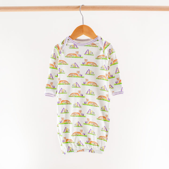 Kids long pajama top in white with multicolor icon print and purple-trimmed neckline