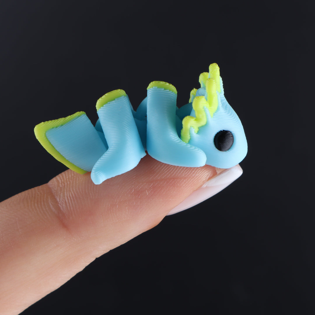 Blue and lime animal fidget toy with round eye and ridged body