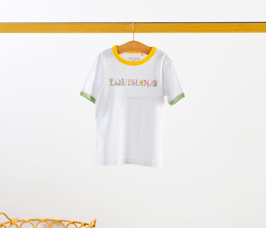 White organic cotton kids tee with yellow collar and green sleeve cuffs, Louisiana graphic