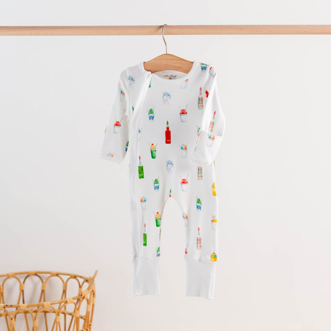 Kids white pajama set with long sleeves and full-length pants, colorful ice-pop print