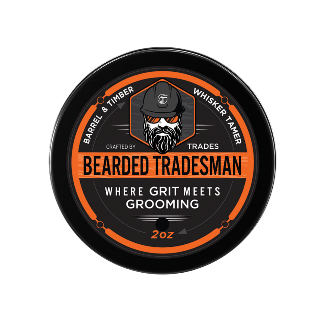 Round grooming balm tin, black with orange label and bearded man logo, 2oz size