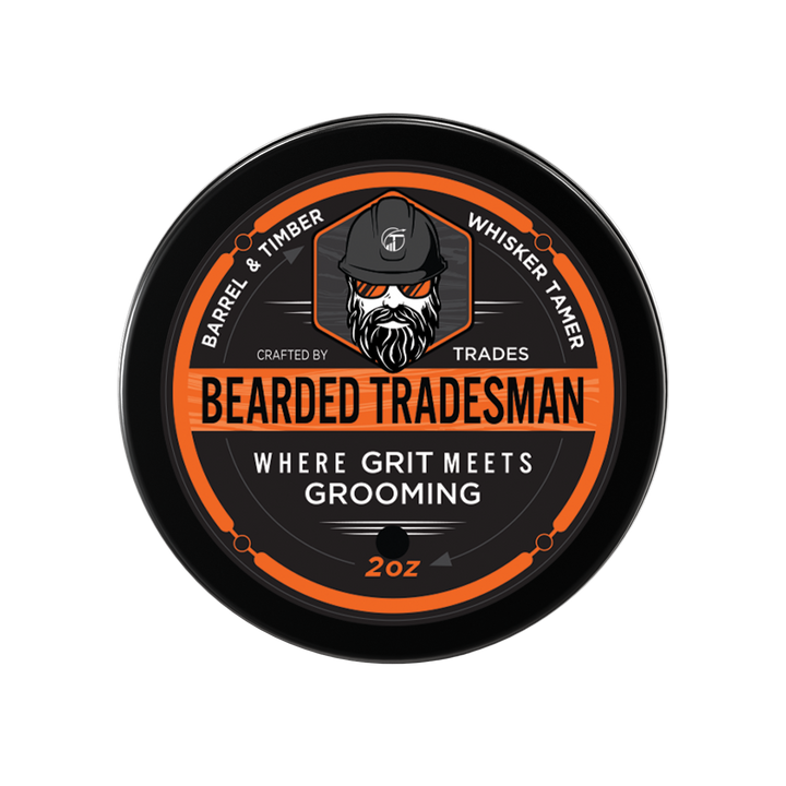 Round grooming balm tin, black with orange label and bearded man logo, 2oz size