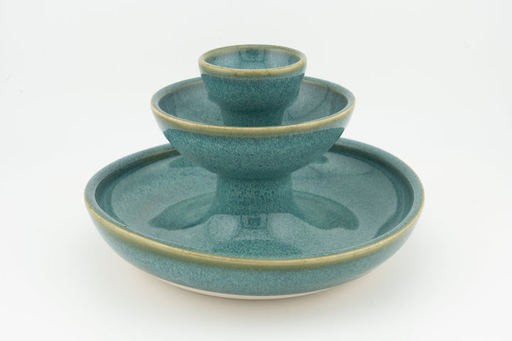Teal ceramic jewelry fountain set with central cup and shallow saucer