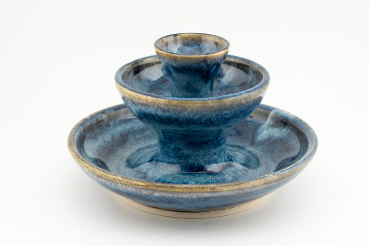 Three-tier blue ceramic jewelry fountain with central cup