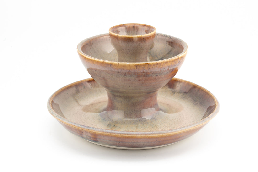 Tan ceramic jewelry fountain set with central cup and wide base