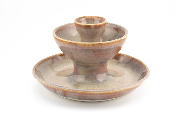 Tan ceramic jewelry fountain set with central cup and wide base
