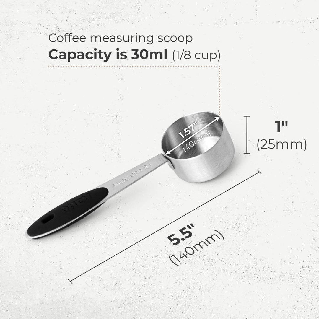 Stainless steel coffee measuring scoop with black handle, 30 ml capacity