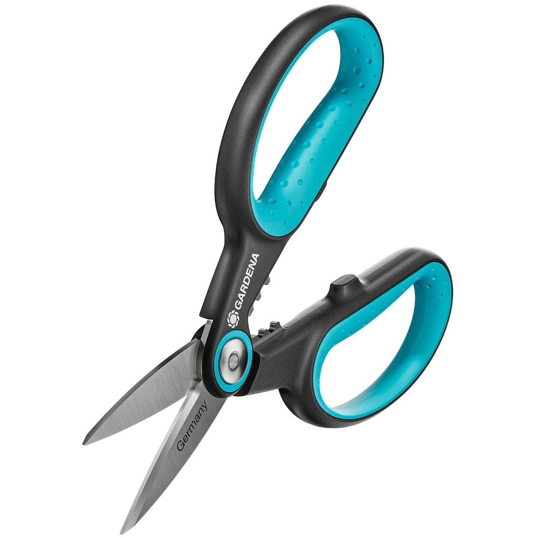 Herb scissors with teal finger rings and pointed stainless blades, side view