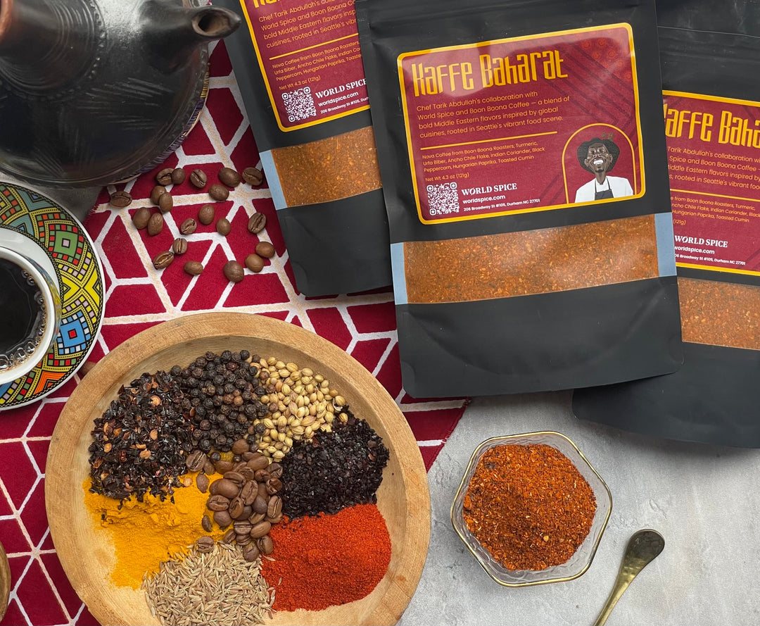 Coffee spice blend pouch with orange-brown spice bowls, spoon, and spice plate.
