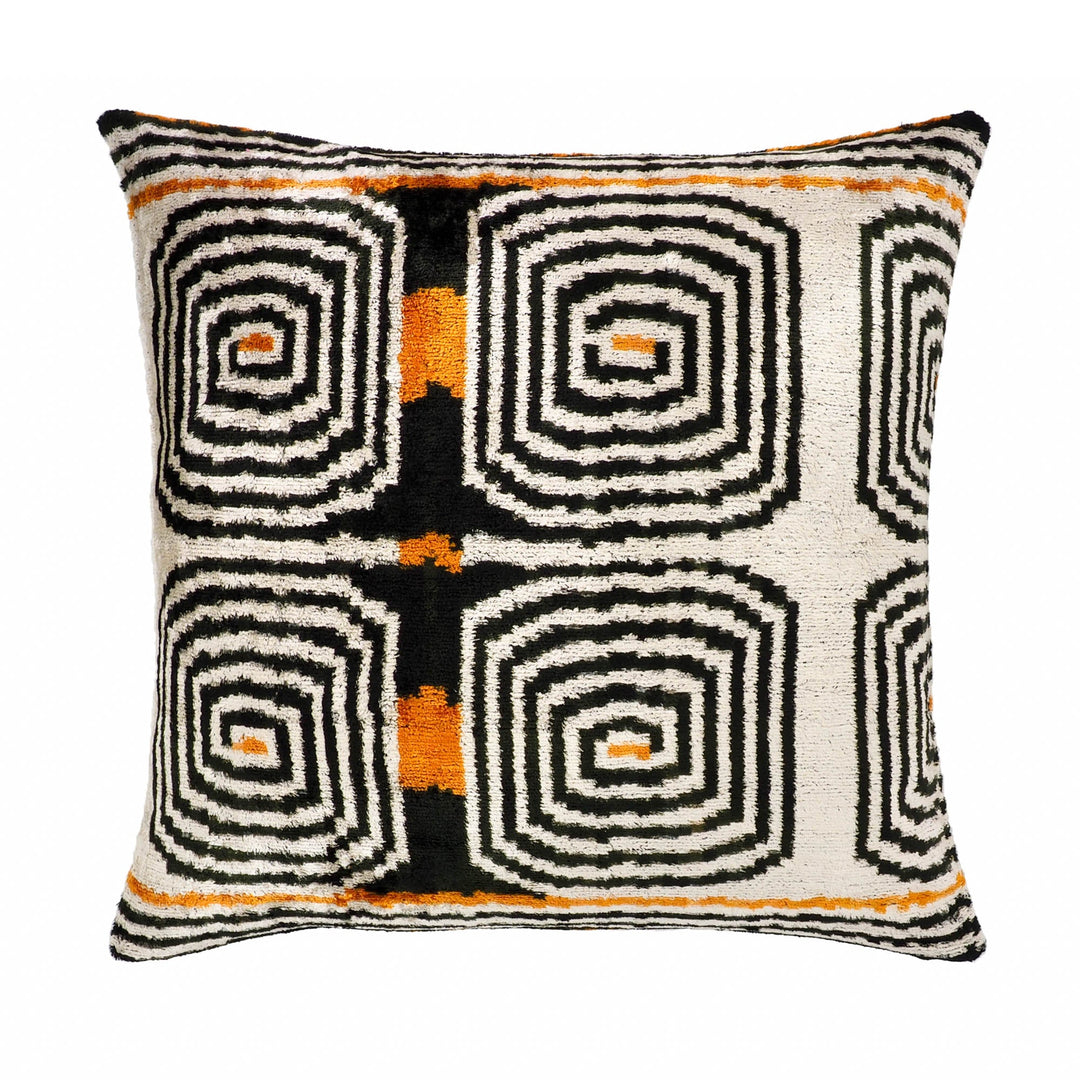 Square silk velvet pillow cover with cream, black, and orange labyrinth ikat geometric pattern