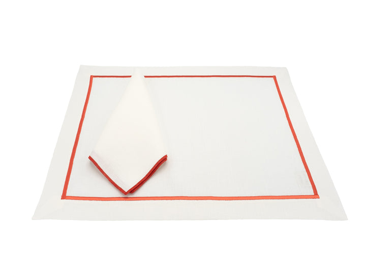 Linen placemat with red border and triangular corner fold