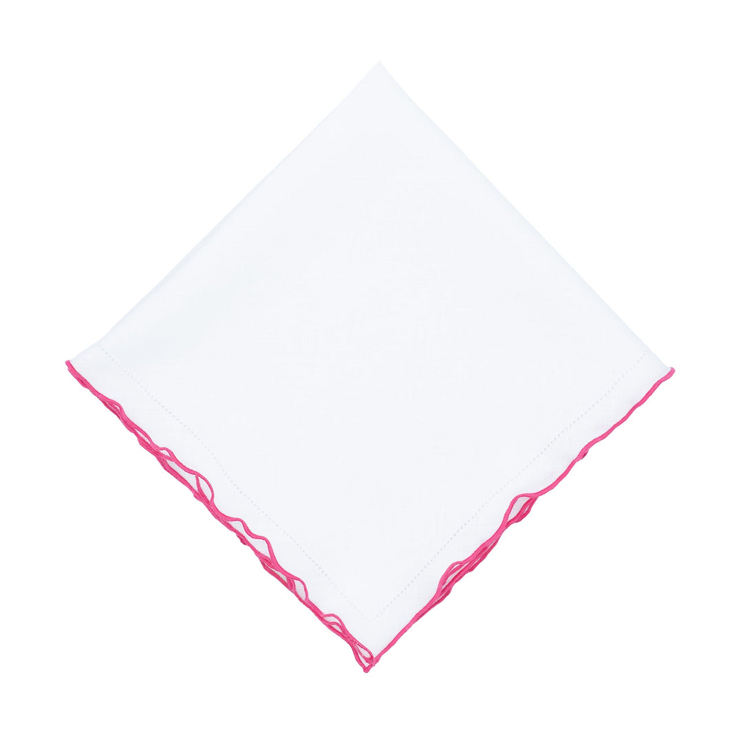 White linen napkin with pink ruffled hemstitch edge detail