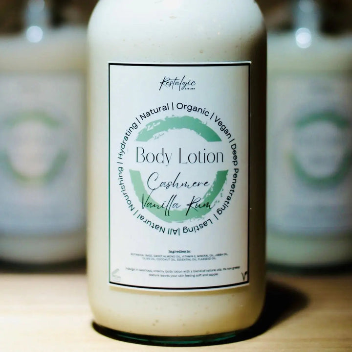 Amber body lotion bottle with black pump labeled Cashmere Vanilla Rum