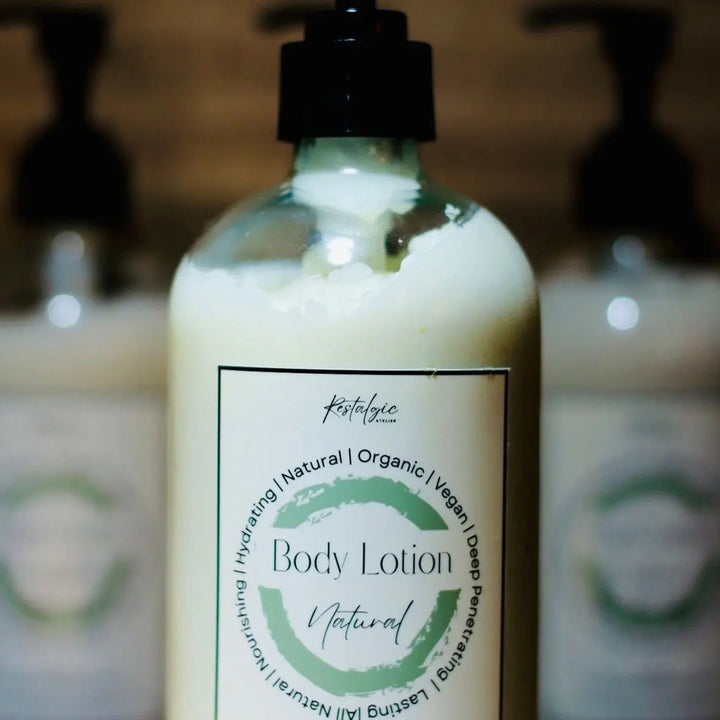 Amber body lotion bottle with black pump labeled Natural