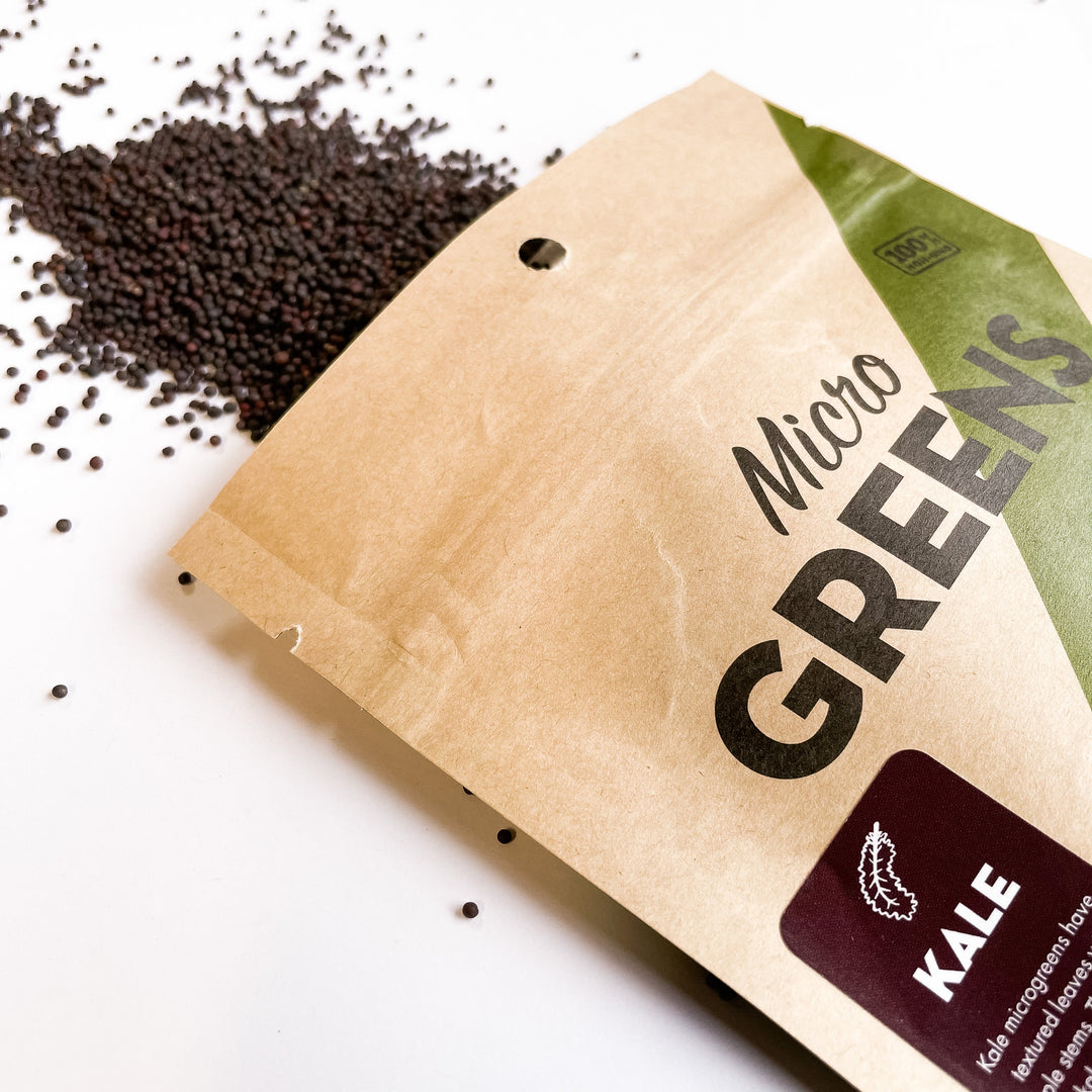 Kale microgreen seed packet in kraft paper pouch with green MicroGreens label