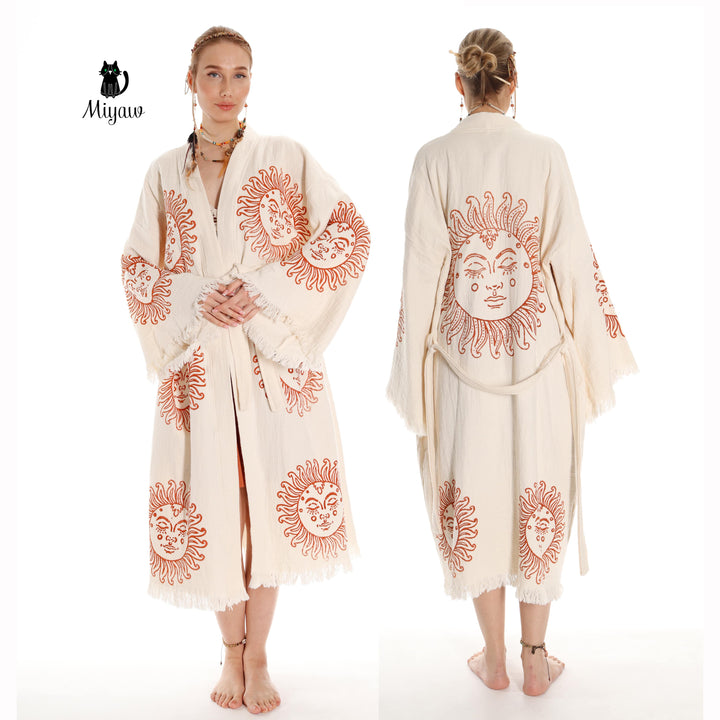 Beige cotton kimono robe with orange sun-face print and tassel trim, front and back view