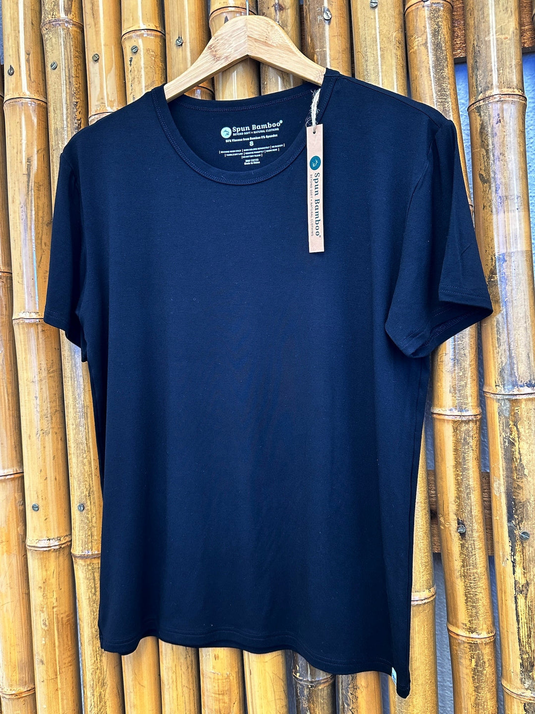 Navy short-sleeve crew-neck lounge T-shirt on wooden hanger with tag
