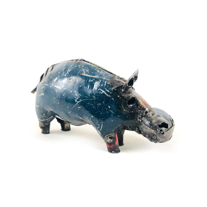Recycled metal pig figurine in blue with scuffed finish, head-on side
