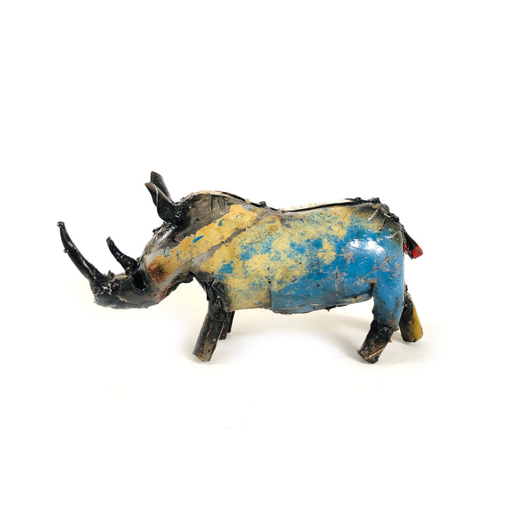 Recycled metal rhino sculpture, side profile, blue and yellow body with raised horns