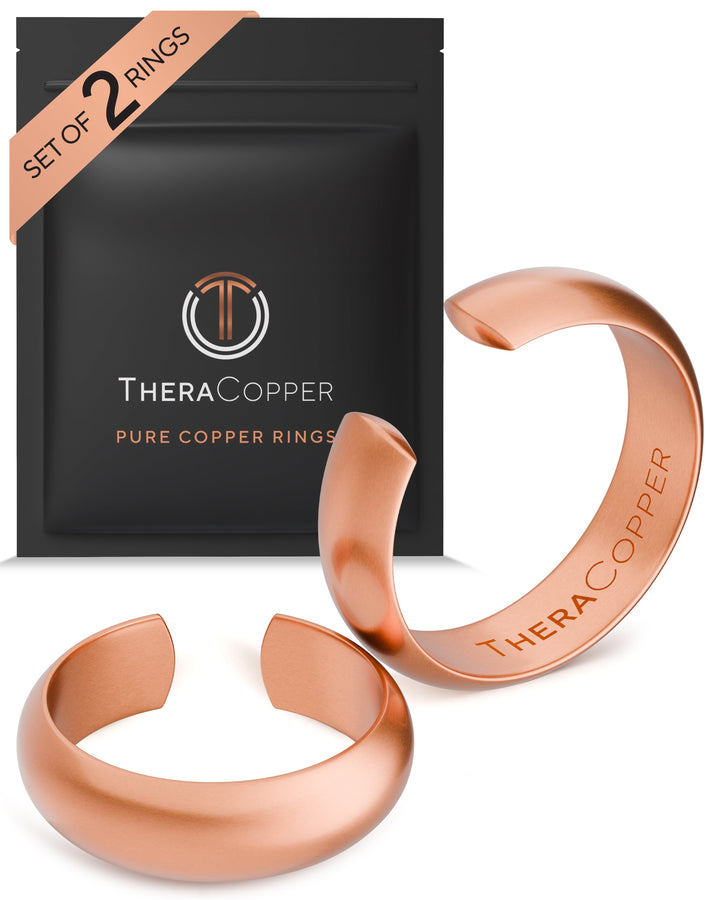 Pure copper domed rings set with rounded open band rings shown together