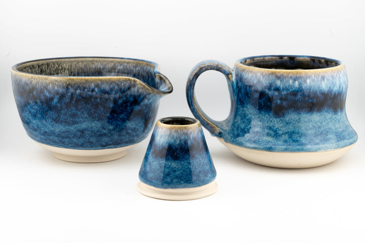 Blue ceramic matcha bowl (chawan) gift set with two mugs and a small spouted creamer