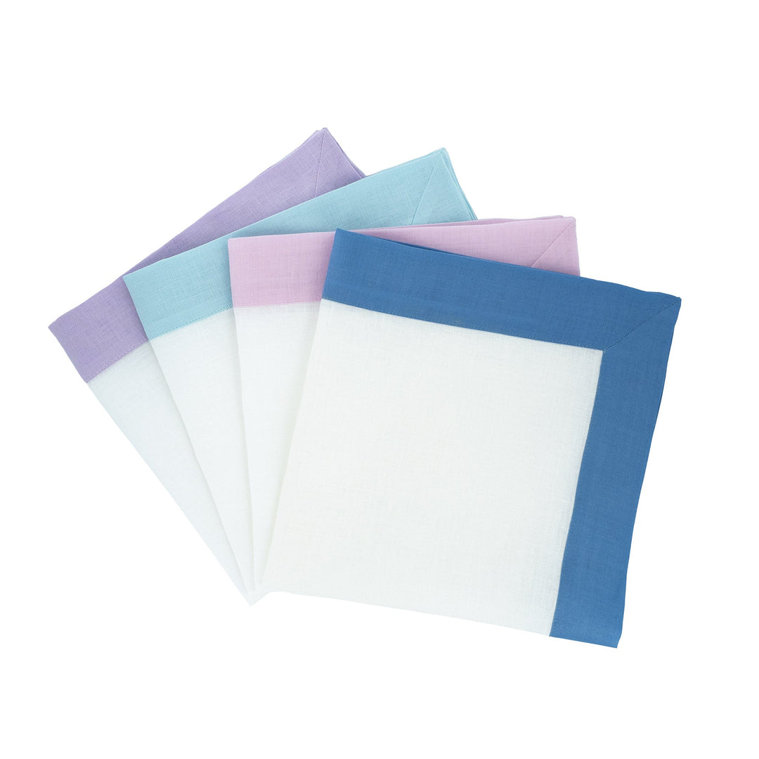Linen napkin set with mint and white panels and contrasting borders (blue/purple)