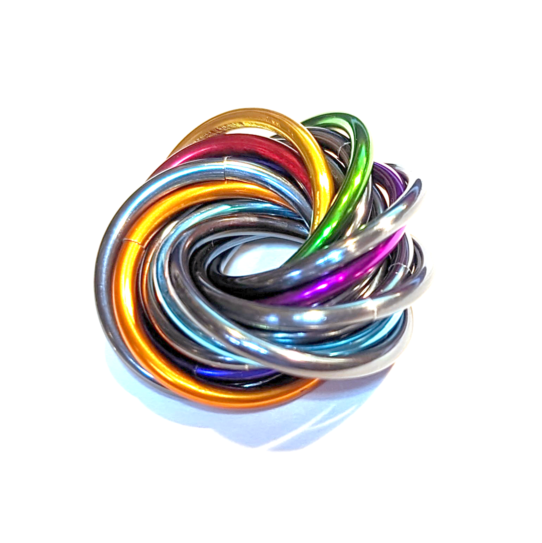 Shiny multicolor fidget stress ball with chrome-like metallic rainbow loop coil