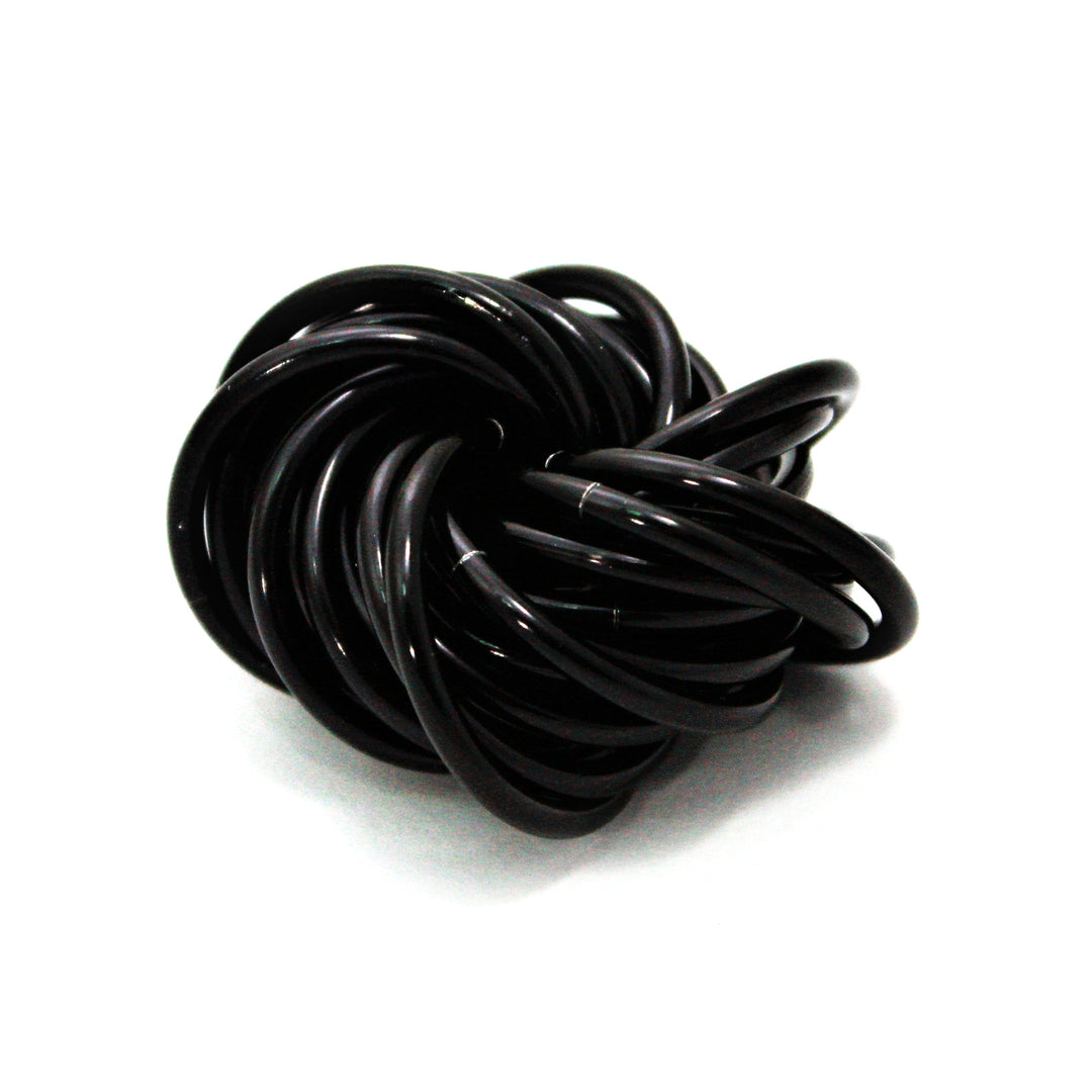 Glossy black stress fidget ball with tightly coiled twisted knot loops.