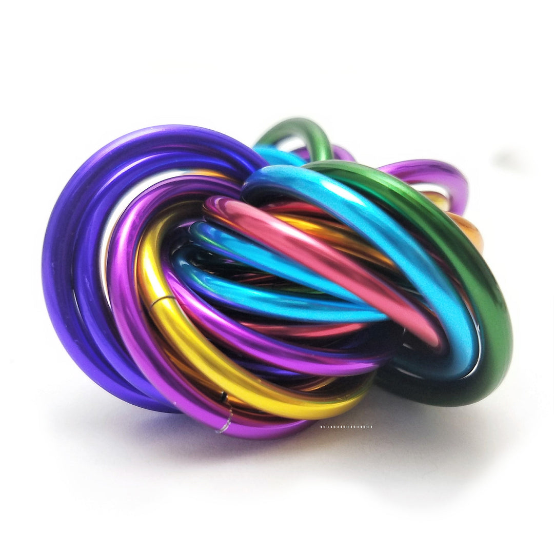 Multicolor metal fidget ball with braided loops, purple teal gold pink and blue