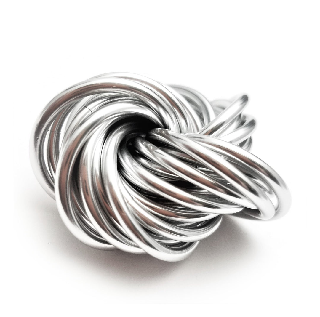 Silver metallic stress ball fidget toy with twisted looped cords ball shape.