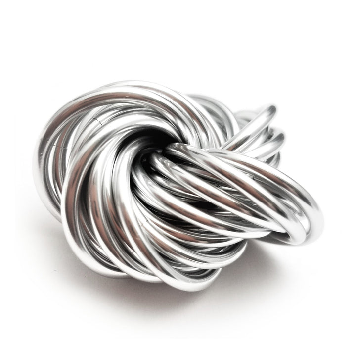 Silver metallic stress ball fidget toy with twisted looped cords ball shape.